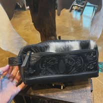 Tooled toiletry bag