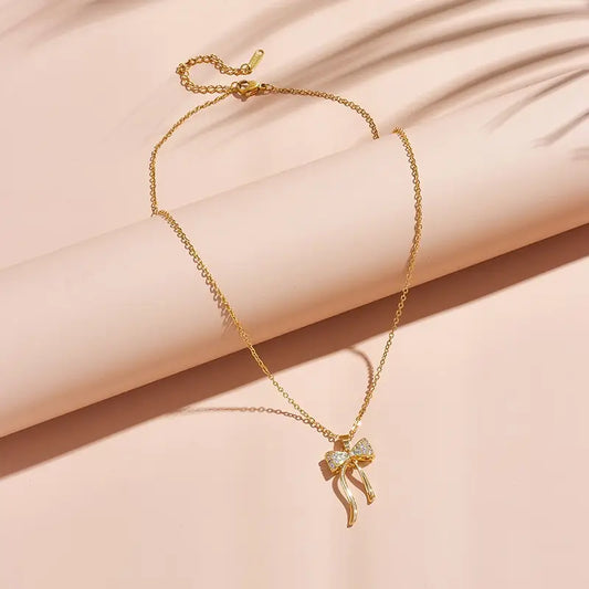 Leave A Little Sparkle Stainless Steel Gold Bow Necklace