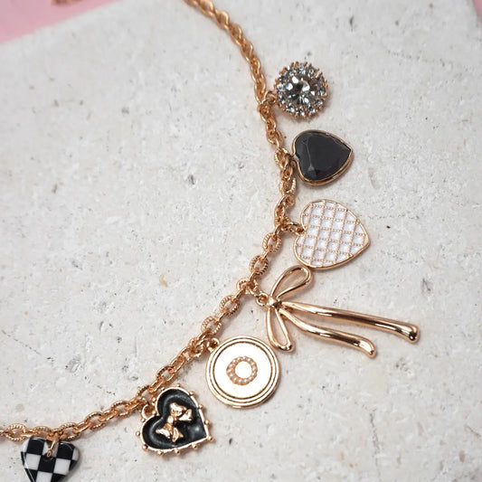 Creating A Purpose Check Heart Gold Bow Necklace